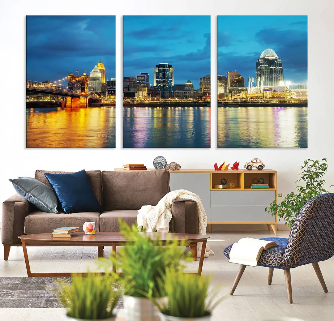 Displayed on a museum-quality canvas, the "Cincinnati City Lights Night Blue Skyline Cityscape View Wall Art Canvas Print" captures the city skyline's reflection in water at night.