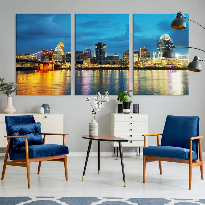 Displayed on a museum-quality canvas, the "Cincinnati City Lights Night Blue Skyline Cityscape View Wall Art Canvas Print" captures the city skyline's reflection in water at night.