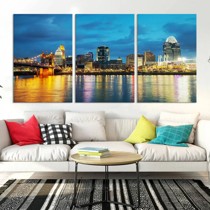 Displayed on a museum-quality canvas, the "Cincinnati City Lights Night Blue Skyline Cityscape View Wall Art Canvas Print" captures the city skyline's reflection in water at night.