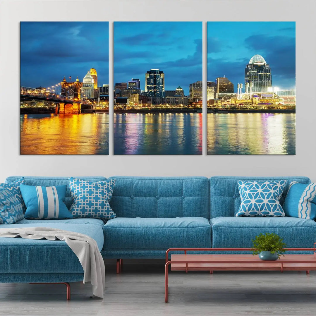 Displayed on a museum-quality canvas, the "Cincinnati City Lights Night Blue Skyline Cityscape View Wall Art Canvas Print" captures the city skyline's reflection in water at night.