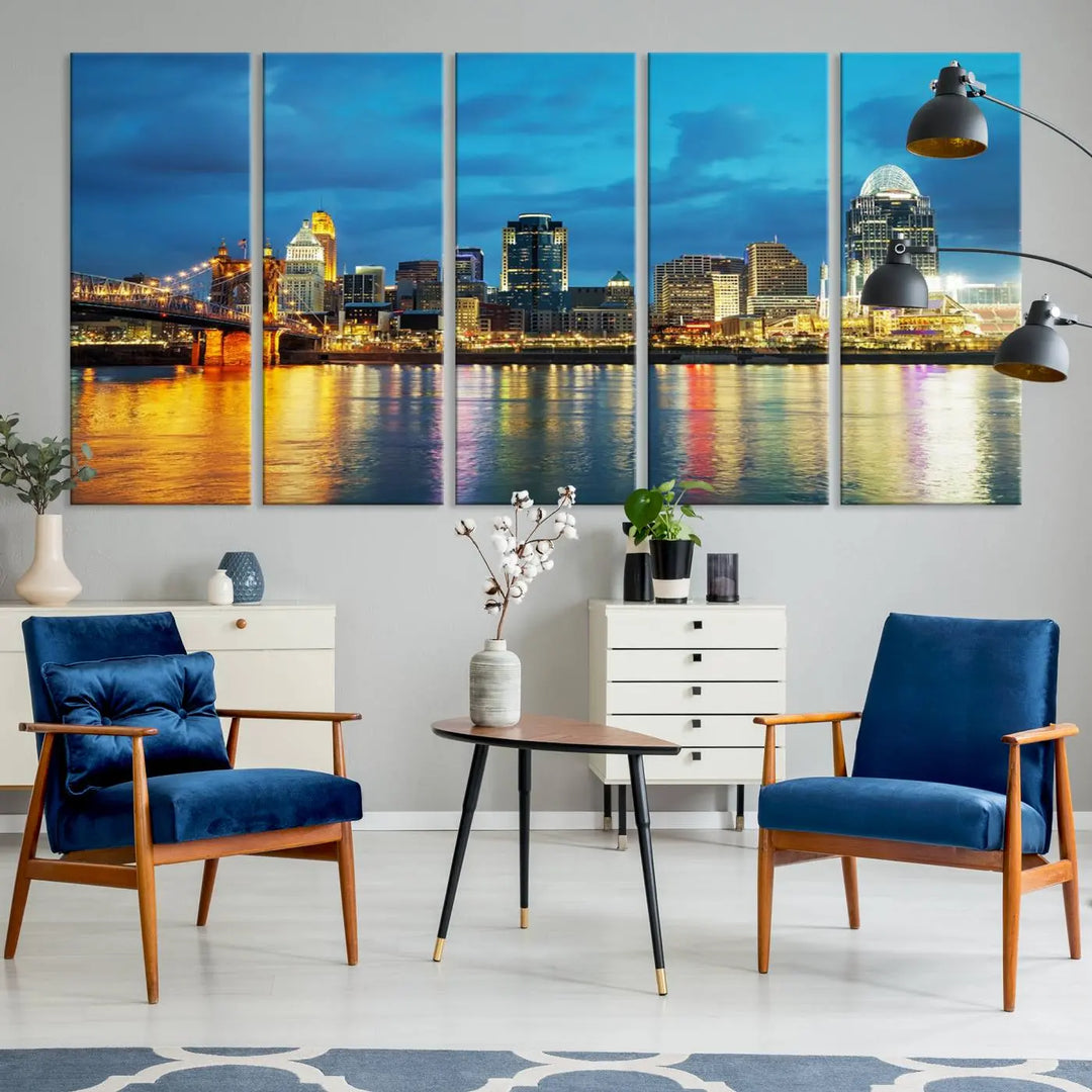 Displayed on a museum-quality canvas, the "Cincinnati City Lights Night Blue Skyline Cityscape View Wall Art Canvas Print" captures the city skyline's reflection in water at night.