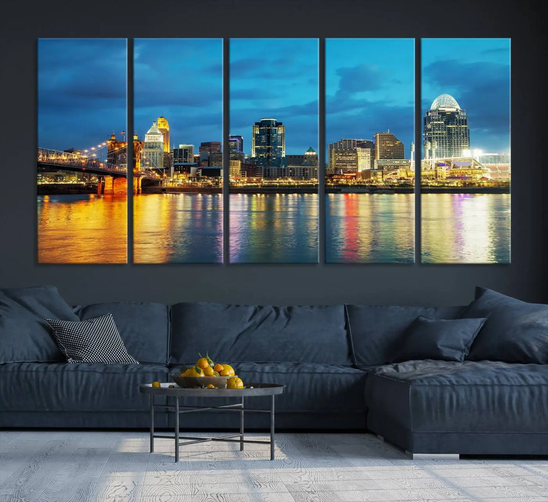 Displayed on a museum-quality canvas, the "Cincinnati City Lights Night Blue Skyline Cityscape View Wall Art Canvas Print" captures the city skyline's reflection in water at night.