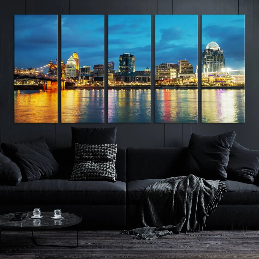 Displayed on a museum-quality canvas, the "Cincinnati City Lights Night Blue Skyline Cityscape View Wall Art Canvas Print" captures the city skyline's reflection in water at night.