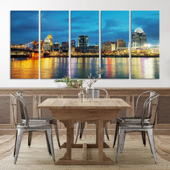 Displayed on a museum-quality canvas, the "Cincinnati City Lights Night Blue Skyline Cityscape View Wall Art Canvas Print" captures the city skyline's reflection in water at night.