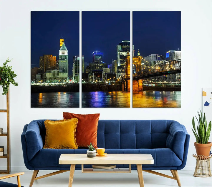 The "Cincinnati City Lights Night Skyline Cityscape" canvas print, displayed above a sofa, exhibits museum-quality craftsmanship with a UV-protective coating.