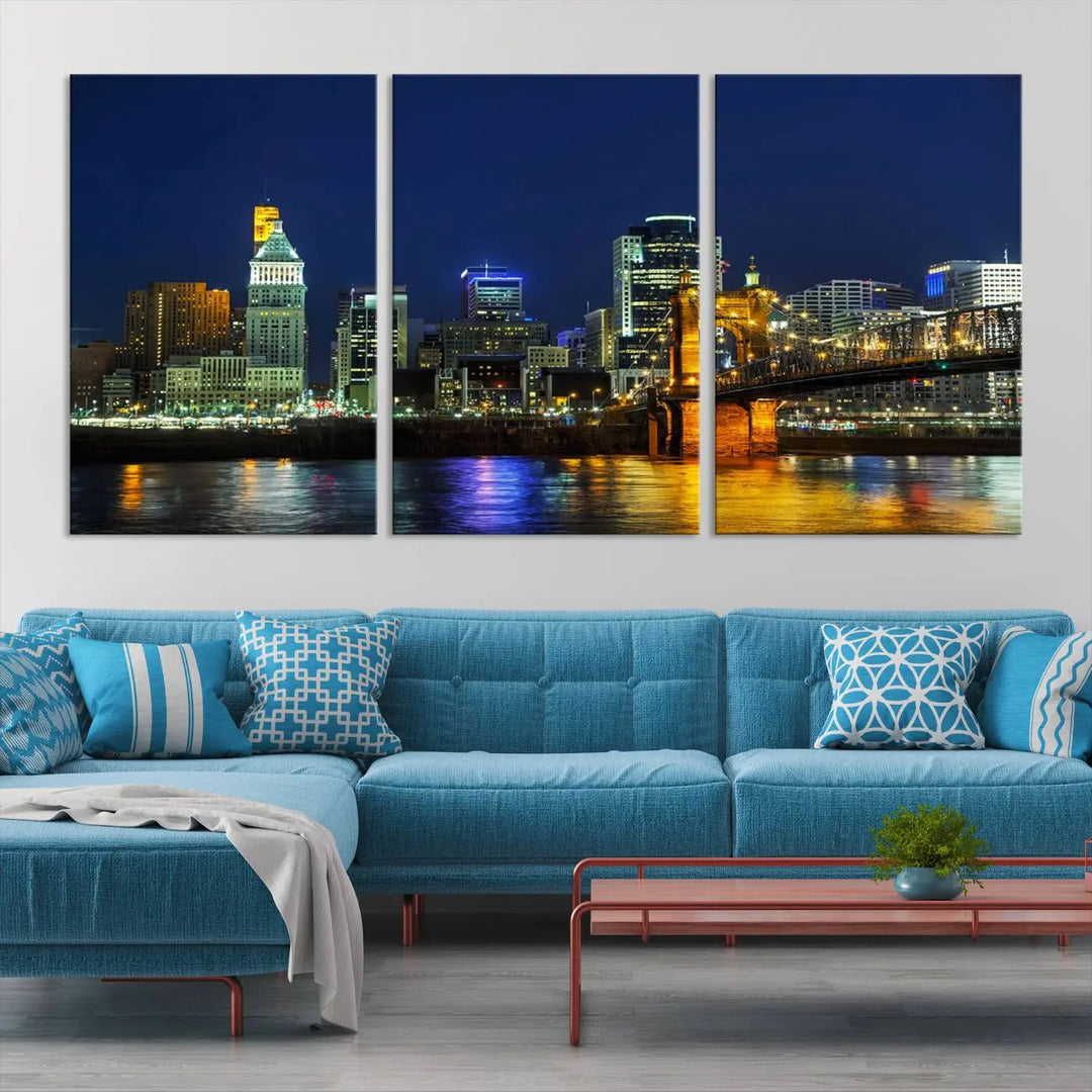 The "Cincinnati City Lights Night Skyline Cityscape" canvas print, displayed above a sofa, exhibits museum-quality craftsmanship with a UV-protective coating.