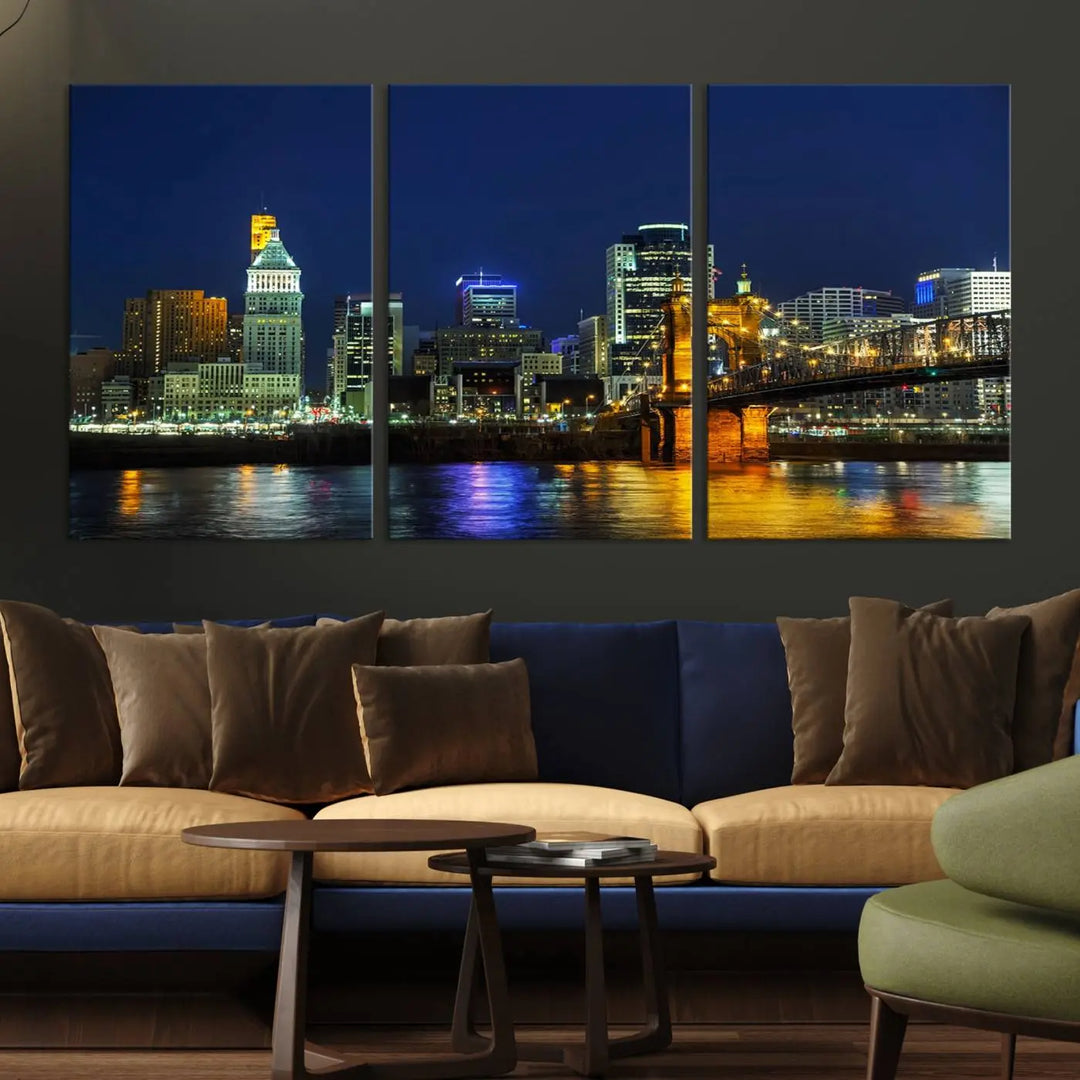 The "Cincinnati City Lights Night Skyline Cityscape" canvas print, displayed above a sofa, exhibits museum-quality craftsmanship with a UV-protective coating.