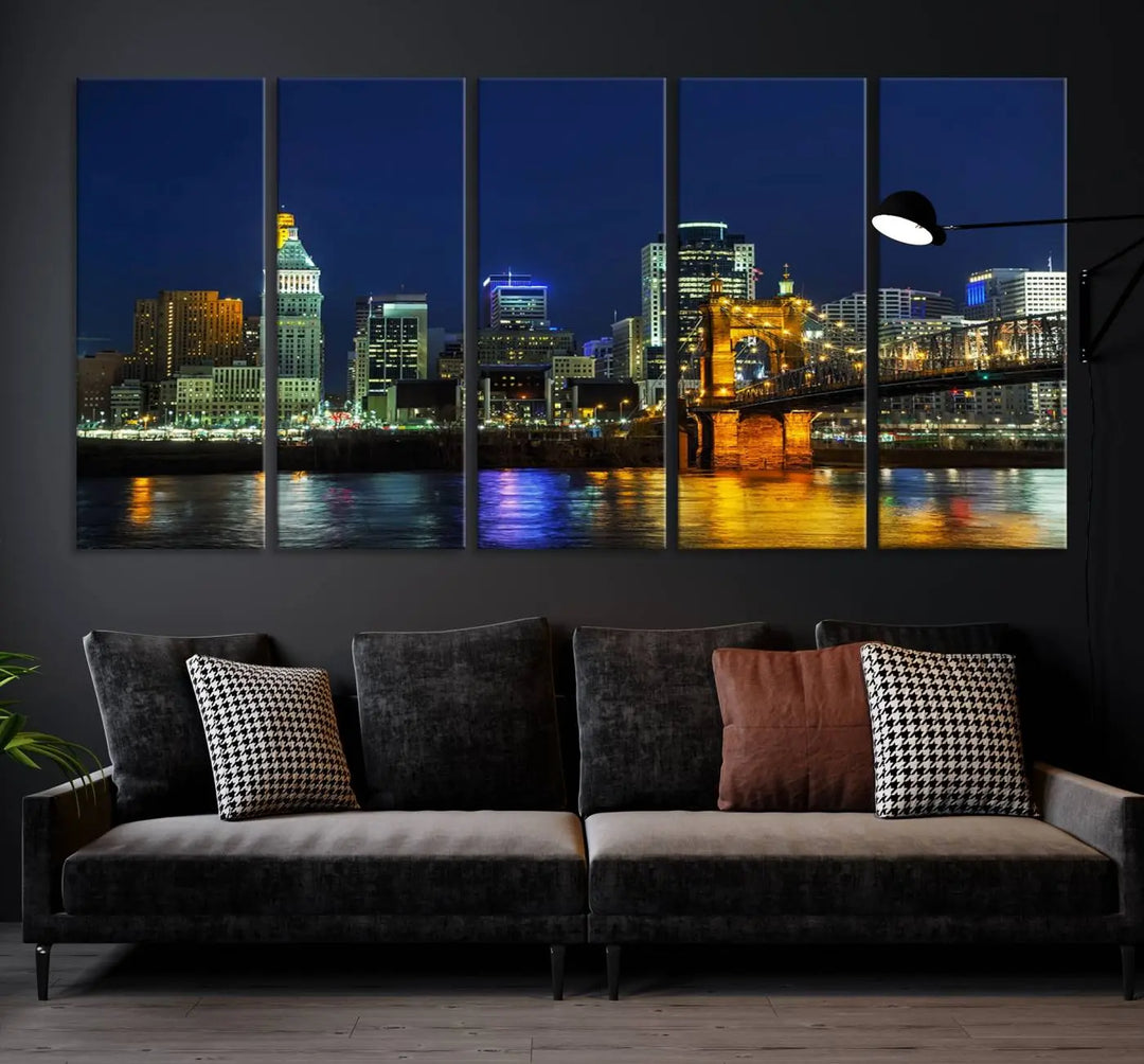 The "Cincinnati City Lights Night Skyline Cityscape" canvas print, displayed above a sofa, exhibits museum-quality craftsmanship with a UV-protective coating.