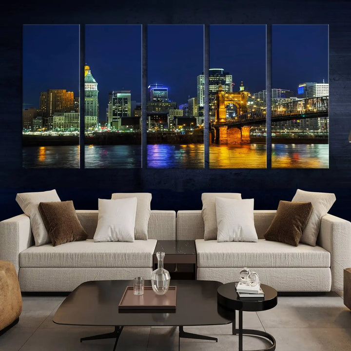 The "Cincinnati City Lights Night Skyline Cityscape" canvas print, displayed above a sofa, exhibits museum-quality craftsmanship with a UV-protective coating.