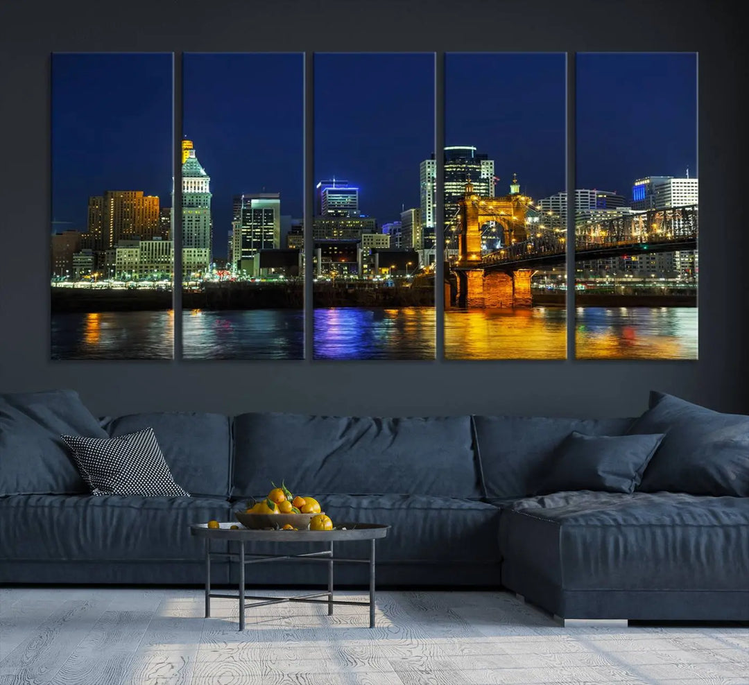 The "Cincinnati City Lights Night Skyline Cityscape" canvas print, displayed above a sofa, exhibits museum-quality craftsmanship with a UV-protective coating.