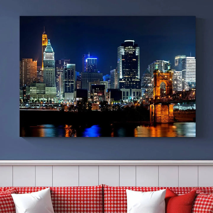 The "Cincinnati City Lights Night Skyline Cityscape View" wall art is displayed on museum-quality canvas with a UV-protective coating for lasting durability.