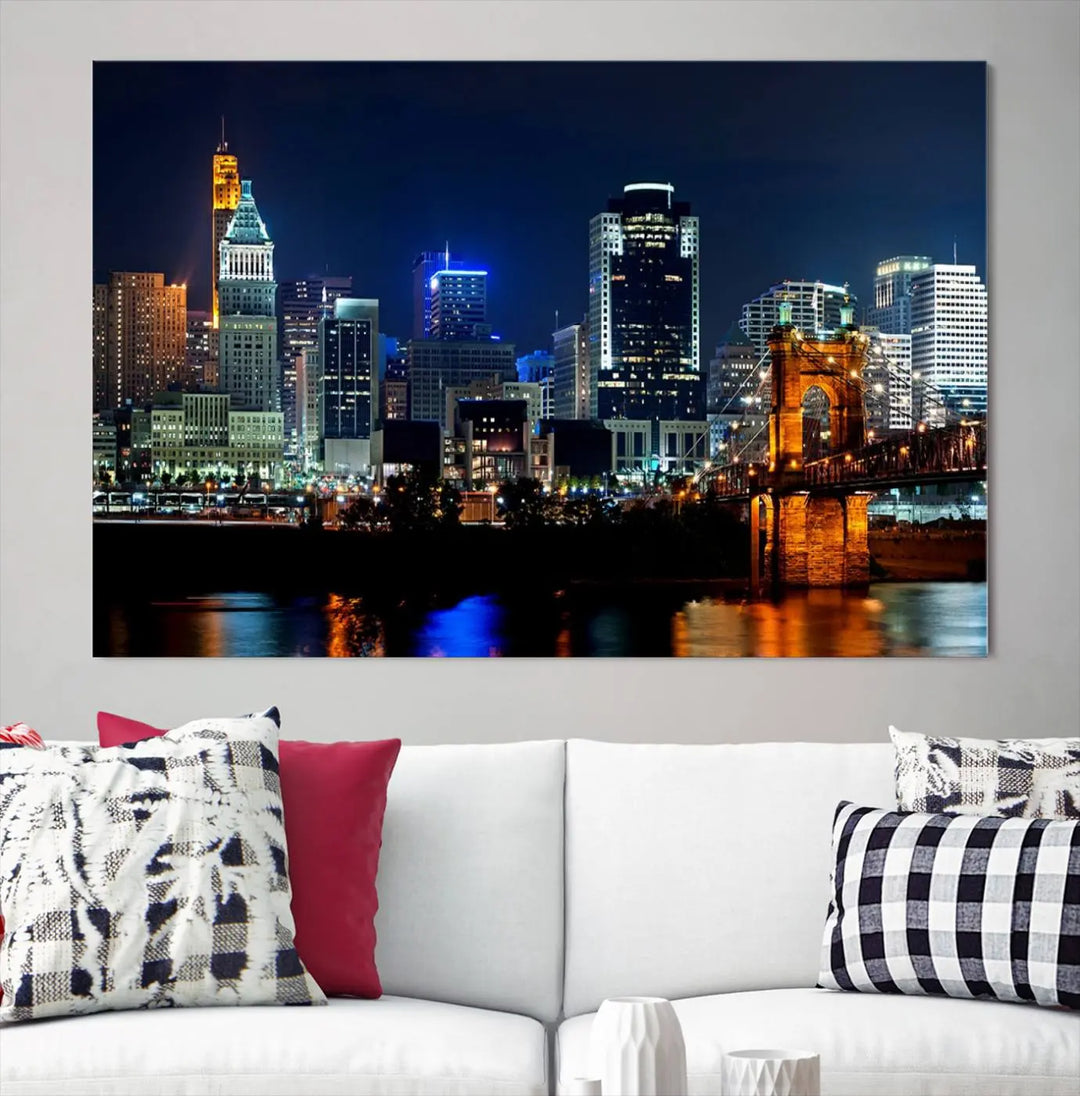 The "Cincinnati City Lights Night Skyline Cityscape View" wall art is displayed on museum-quality canvas with a UV-protective coating for lasting durability.