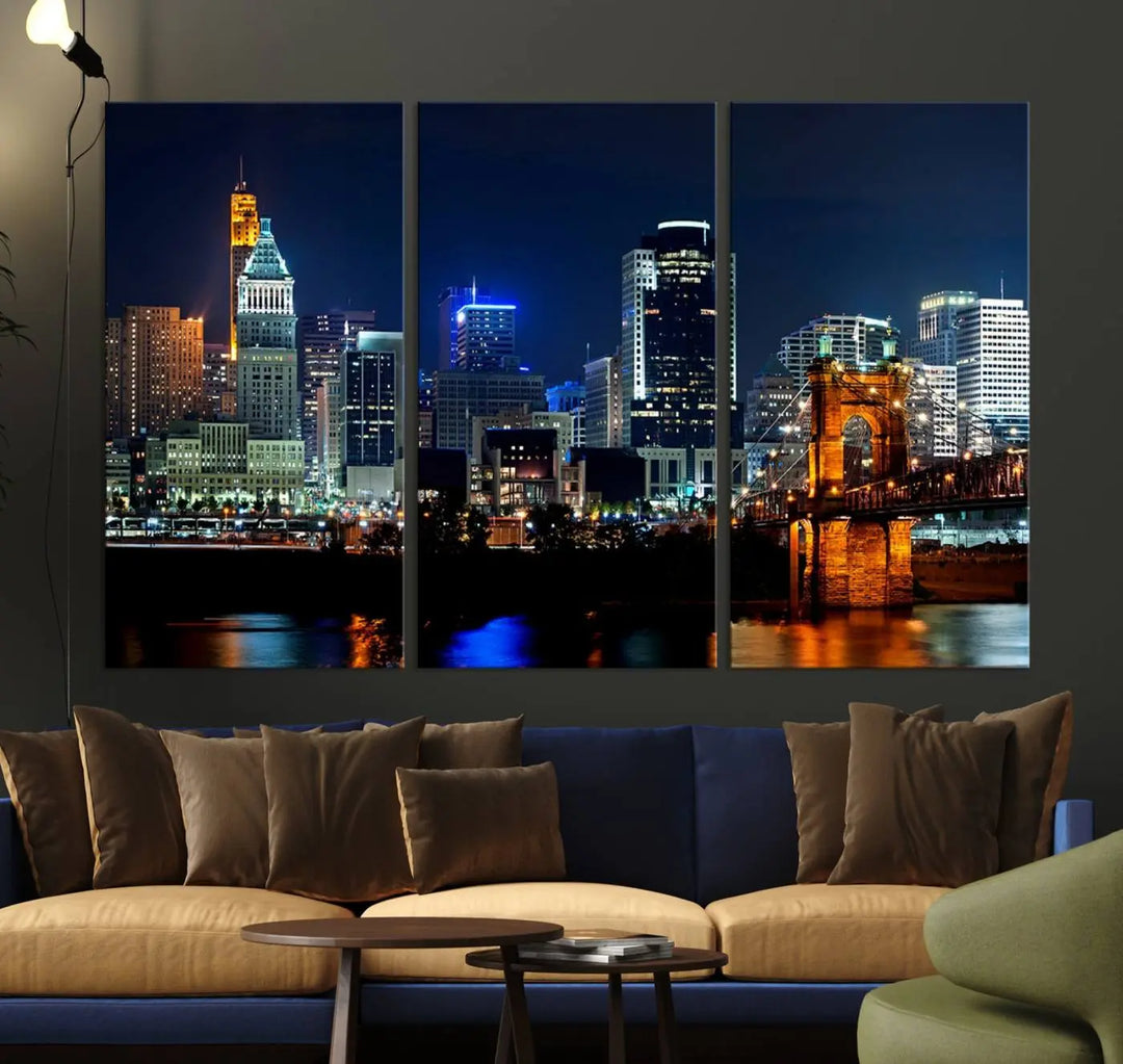 The "Cincinnati City Lights Night Skyline Cityscape View" wall art is displayed on museum-quality canvas with a UV-protective coating for lasting durability.