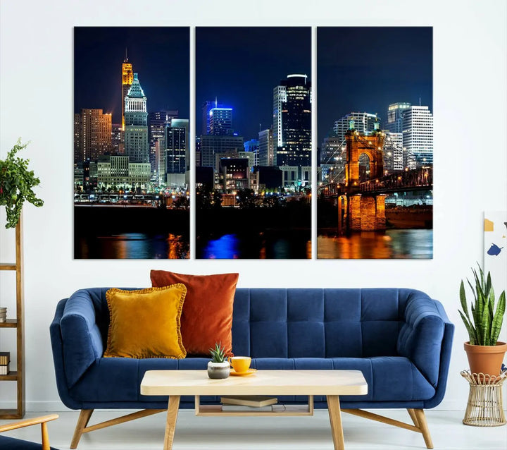 The "Cincinnati City Lights Night Skyline Cityscape View" wall art is displayed on museum-quality canvas with a UV-protective coating for lasting durability.