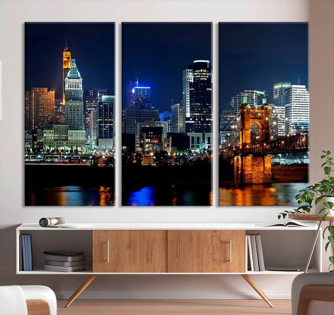 The "Cincinnati City Lights Night Skyline Cityscape View" wall art is displayed on museum-quality canvas with a UV-protective coating for lasting durability.