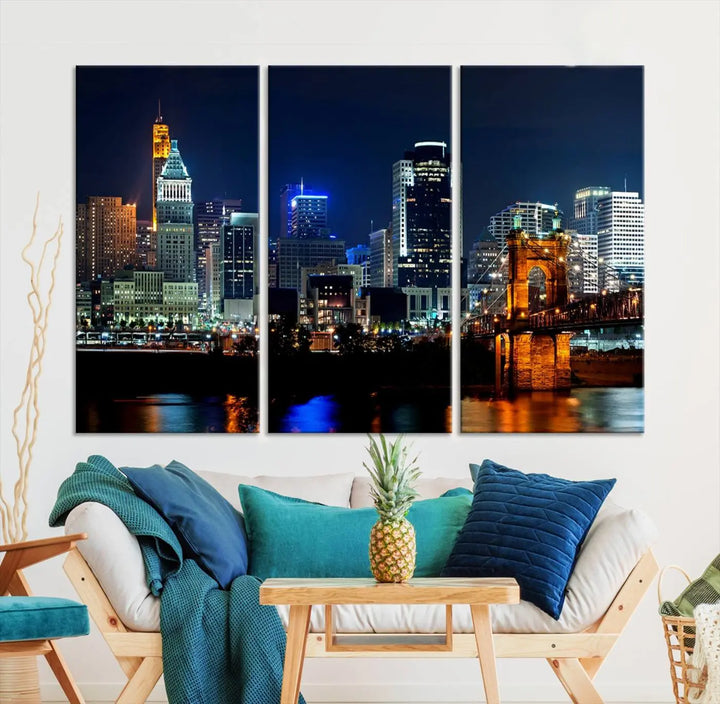 The "Cincinnati City Lights Night Skyline Cityscape View" wall art is displayed on museum-quality canvas with a UV-protective coating for lasting durability.