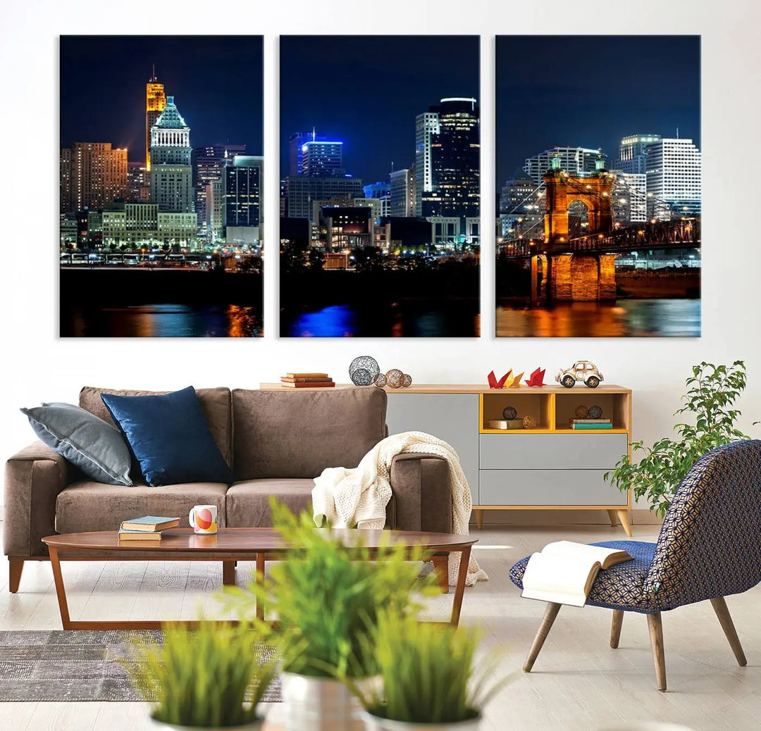 The "Cincinnati City Lights Night Skyline Cityscape View" wall art is displayed on museum-quality canvas with a UV-protective coating for lasting durability.