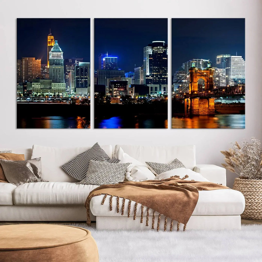 The "Cincinnati City Lights Night Skyline Cityscape View" wall art is displayed on museum-quality canvas with a UV-protective coating for lasting durability.