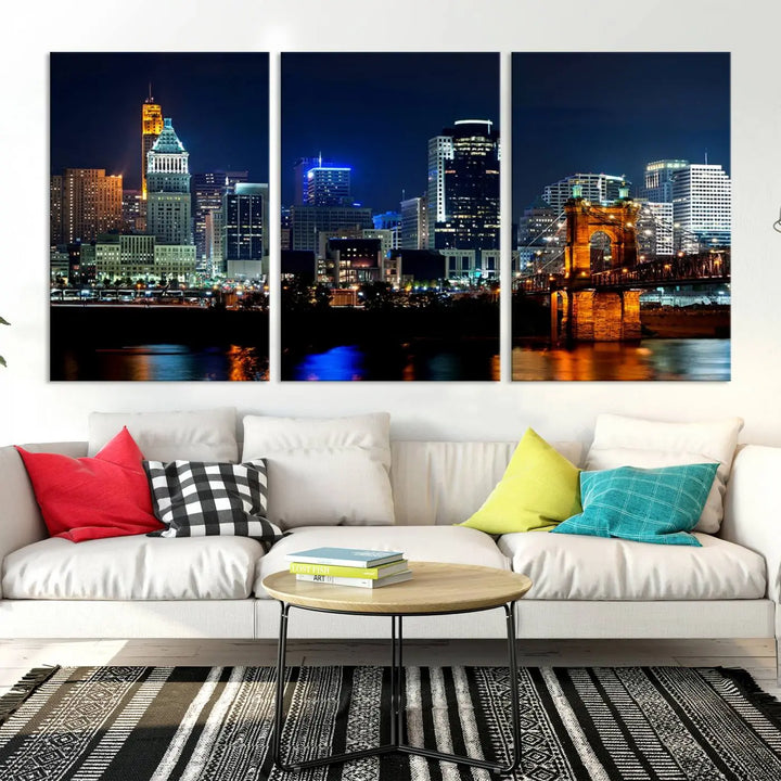 The "Cincinnati City Lights Night Skyline Cityscape View" wall art is displayed on museum-quality canvas with a UV-protective coating for lasting durability.