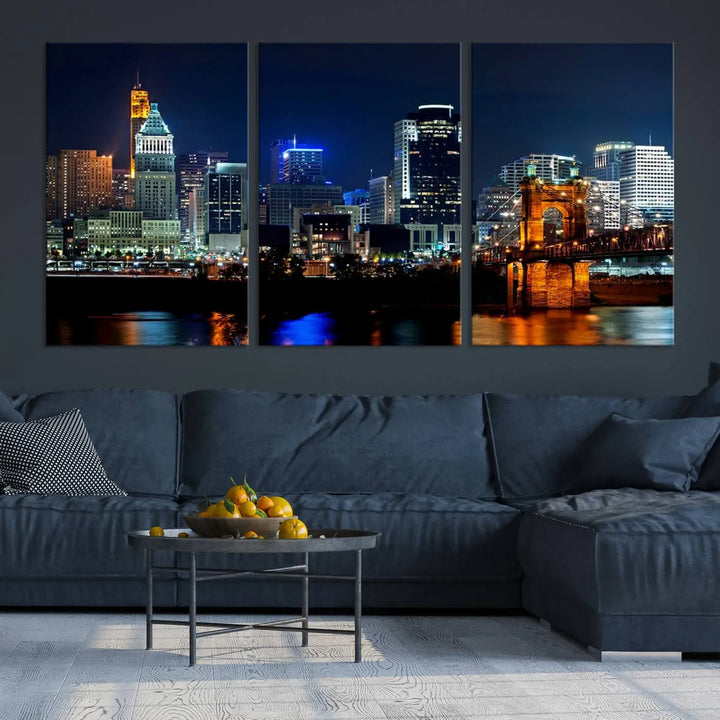 The "Cincinnati City Lights Night Skyline Cityscape View" wall art is displayed on museum-quality canvas with a UV-protective coating for lasting durability.