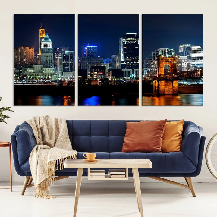 The "Cincinnati City Lights Night Skyline Cityscape View" wall art is displayed on museum-quality canvas with a UV-protective coating for lasting durability.