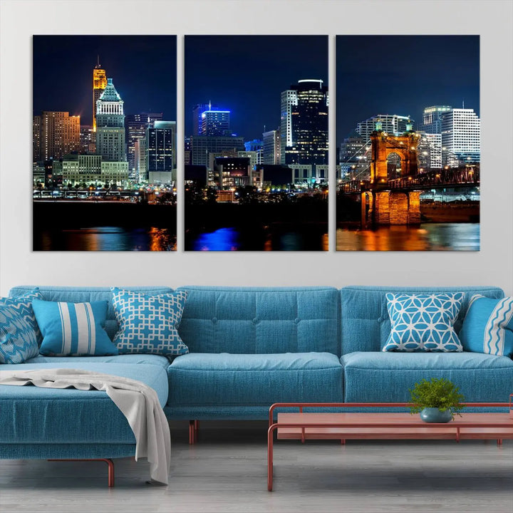 The "Cincinnati City Lights Night Skyline Cityscape View" wall art is displayed on museum-quality canvas with a UV-protective coating for lasting durability.