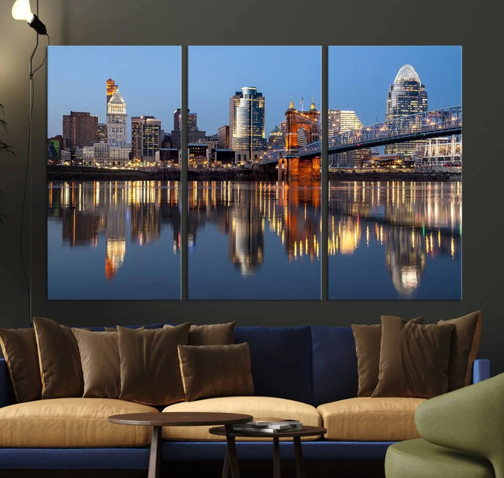 The Cincinnati City Lights Night Skyline Cityscape View Wall Art Canvas Print elegantly hangs, its vibrant reflections dancing on the water. The gallery-wrapped image is crafted on museum-quality canvas, ensuring a stunning display.