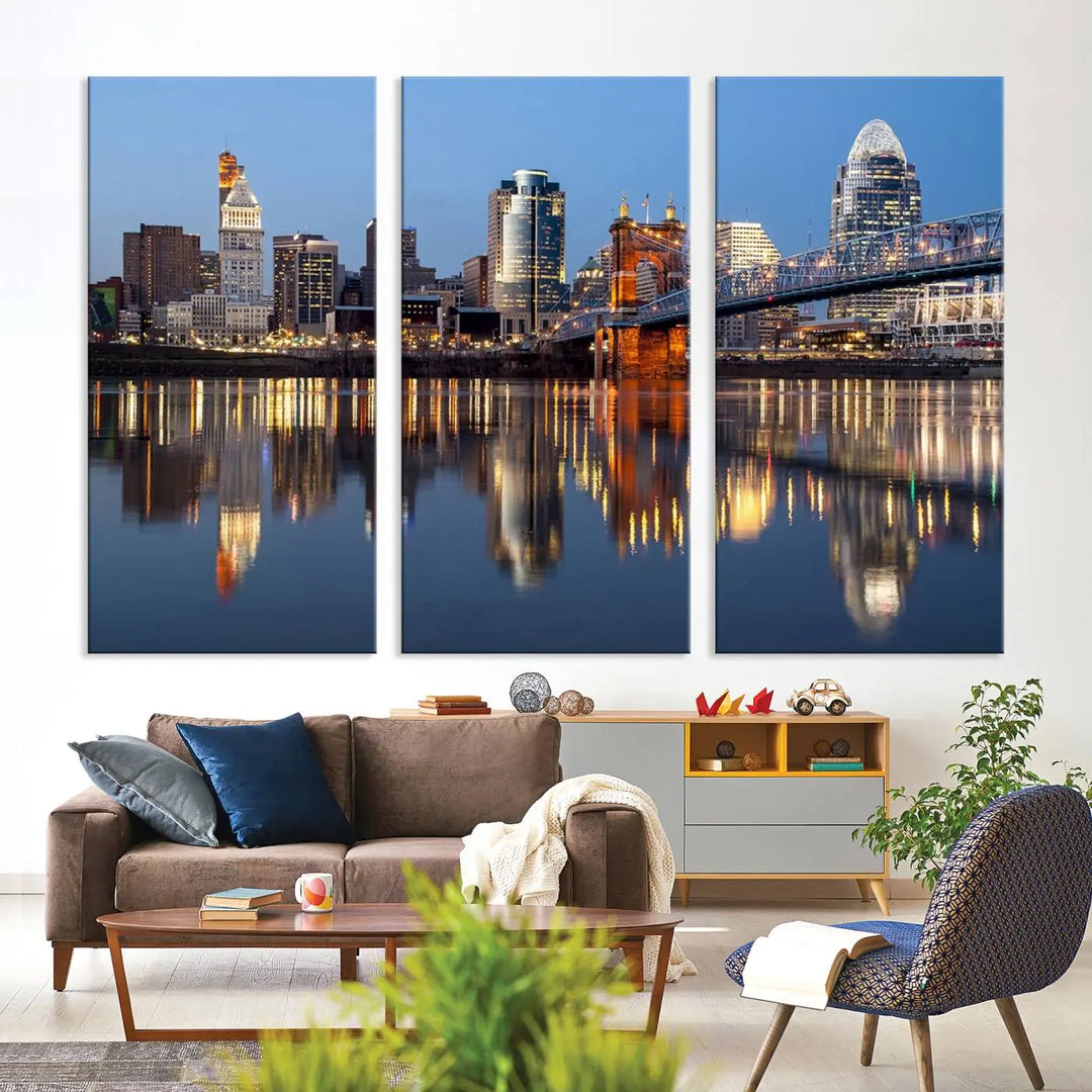 The Cincinnati City Lights Night Skyline Cityscape View Wall Art Canvas Print elegantly hangs, its vibrant reflections dancing on the water. The gallery-wrapped image is crafted on museum-quality canvas, ensuring a stunning display.