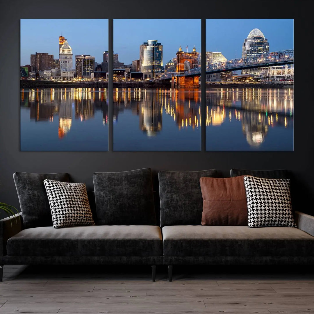 The Cincinnati City Lights Night Skyline Cityscape View Wall Art Canvas Print elegantly hangs, its vibrant reflections dancing on the water. The gallery-wrapped image is crafted on museum-quality canvas, ensuring a stunning display.