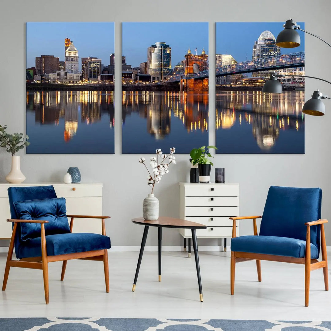 The Cincinnati City Lights Night Skyline Cityscape View Wall Art Canvas Print elegantly hangs, its vibrant reflections dancing on the water. The gallery-wrapped image is crafted on museum-quality canvas, ensuring a stunning display.