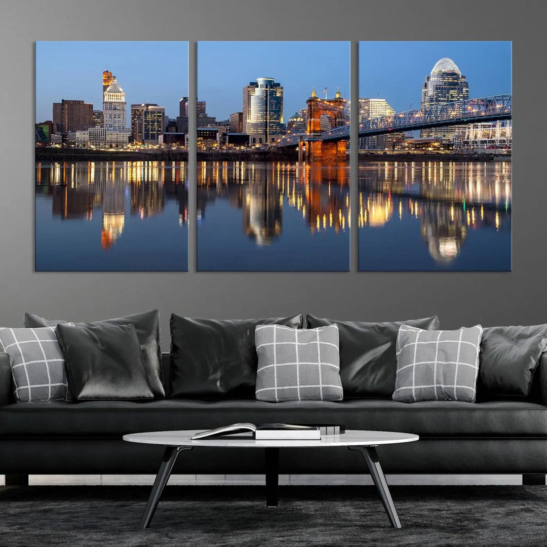 The Cincinnati City Lights Night Skyline Cityscape View Wall Art Canvas Print elegantly hangs, its vibrant reflections dancing on the water. The gallery-wrapped image is crafted on museum-quality canvas, ensuring a stunning display.