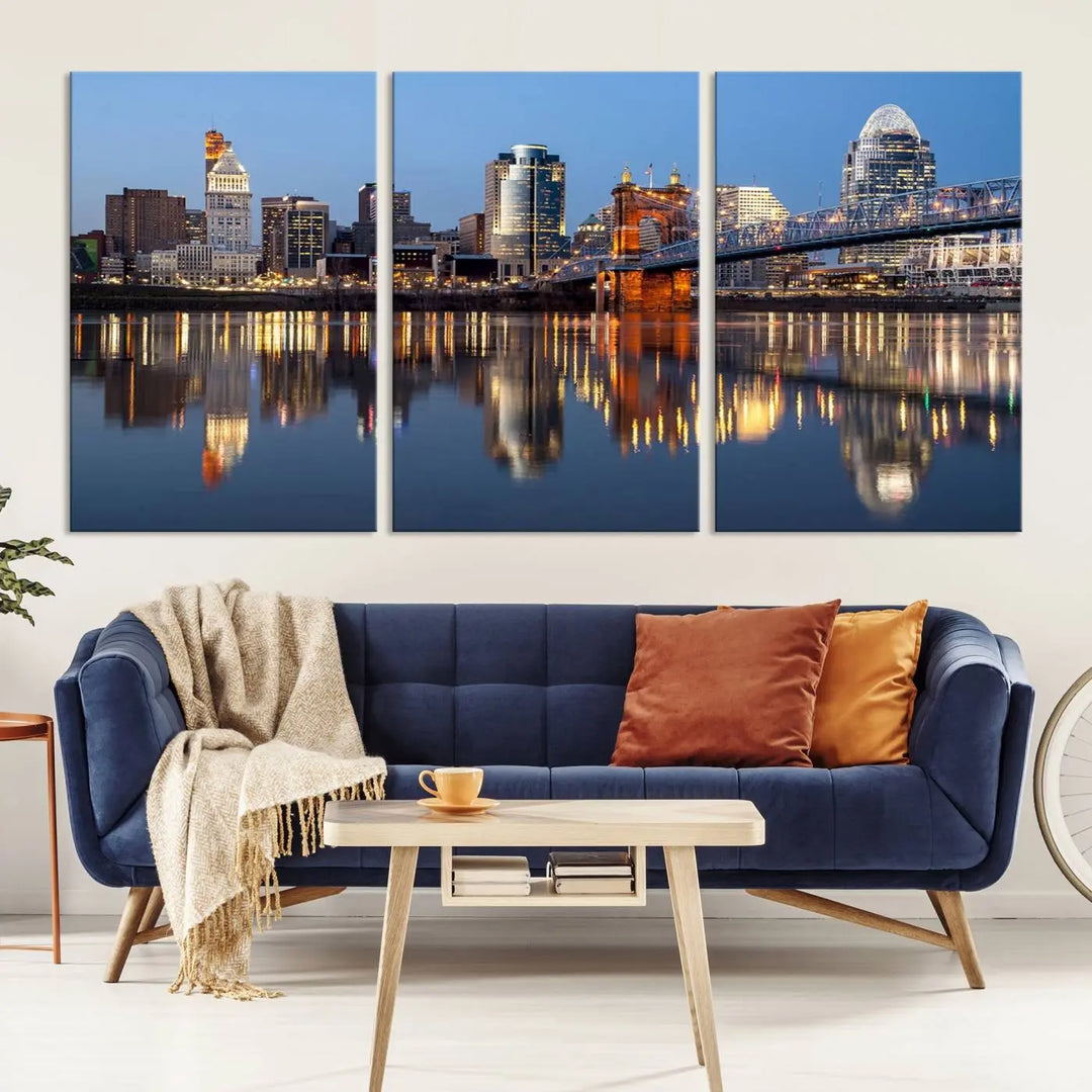 The Cincinnati City Lights Night Skyline Cityscape View Wall Art Canvas Print elegantly hangs, its vibrant reflections dancing on the water. The gallery-wrapped image is crafted on museum-quality canvas, ensuring a stunning display.