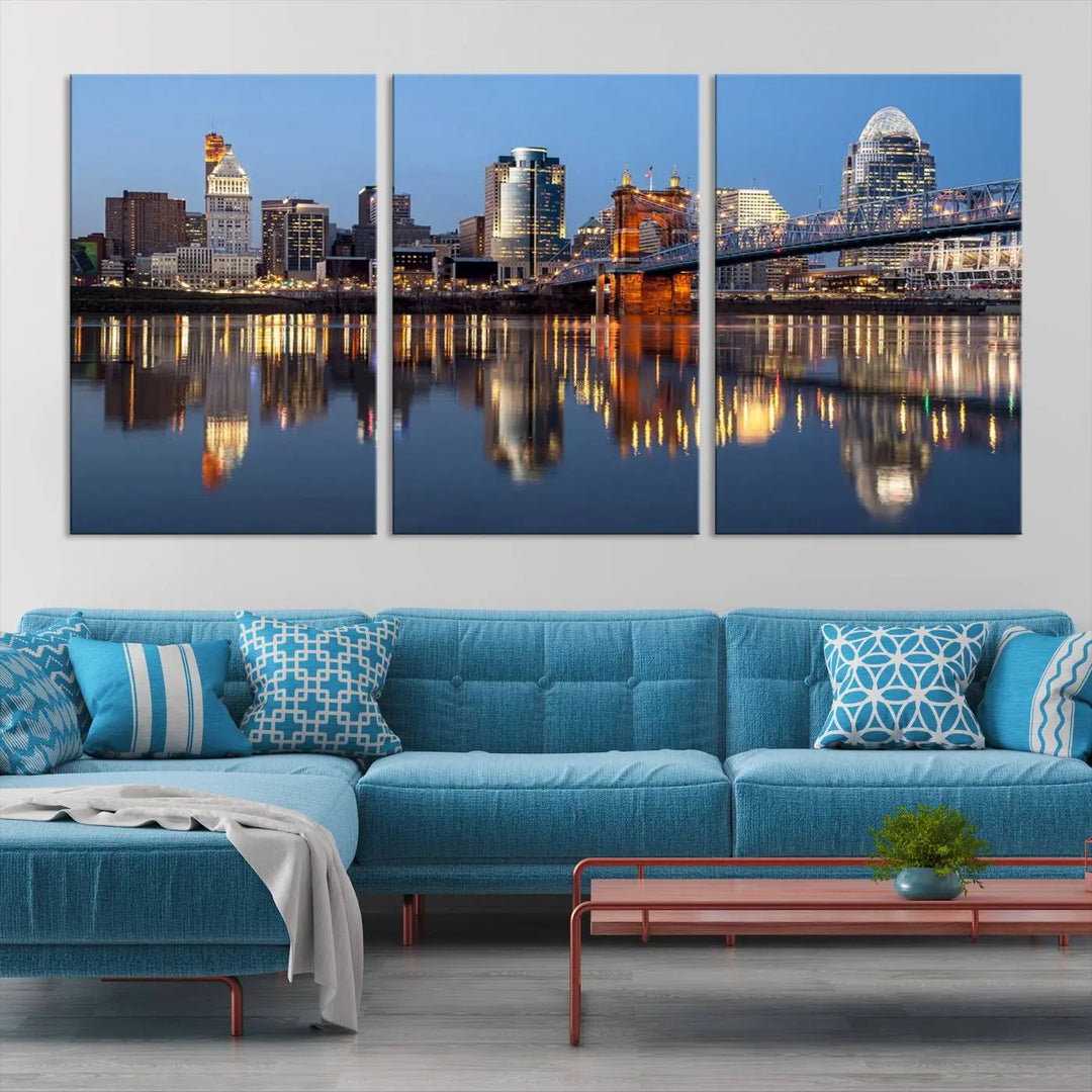 The Cincinnati City Lights Night Skyline Cityscape View Wall Art Canvas Print elegantly hangs, its vibrant reflections dancing on the water. The gallery-wrapped image is crafted on museum-quality canvas, ensuring a stunning display.