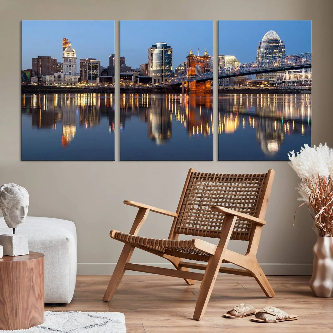 The Cincinnati City Lights Night Skyline Cityscape View Wall Art Canvas Print elegantly hangs, its vibrant reflections dancing on the water. The gallery-wrapped image is crafted on museum-quality canvas, ensuring a stunning display.