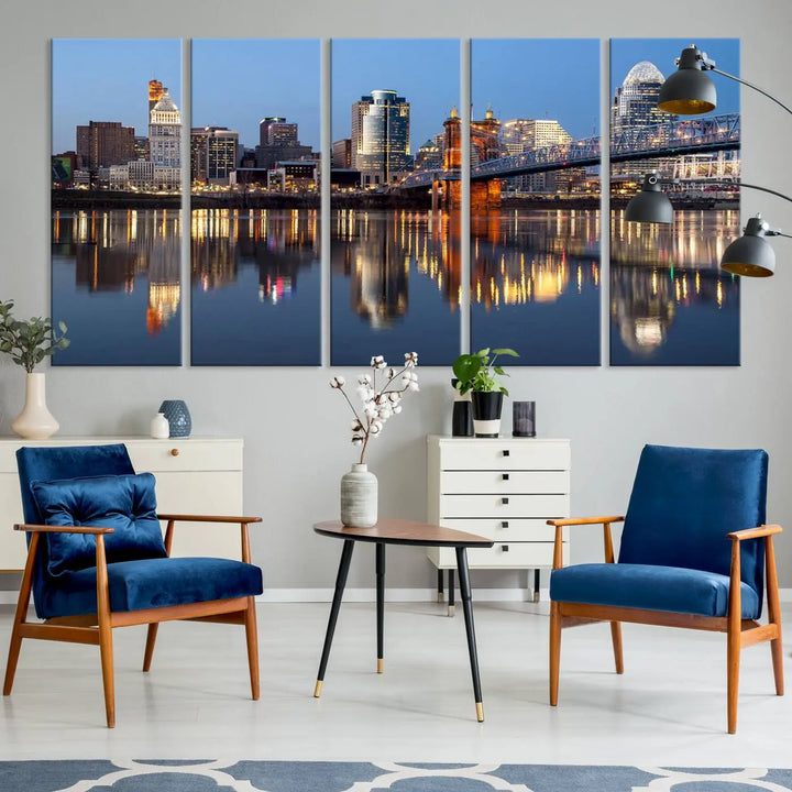 The Cincinnati City Lights Night Skyline Cityscape View Wall Art Canvas Print elegantly hangs, its vibrant reflections dancing on the water. The gallery-wrapped image is crafted on museum-quality canvas, ensuring a stunning display.