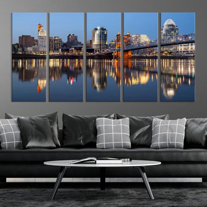 The Cincinnati City Lights Night Skyline Cityscape View Wall Art Canvas Print elegantly hangs, its vibrant reflections dancing on the water. The gallery-wrapped image is crafted on museum-quality canvas, ensuring a stunning display.