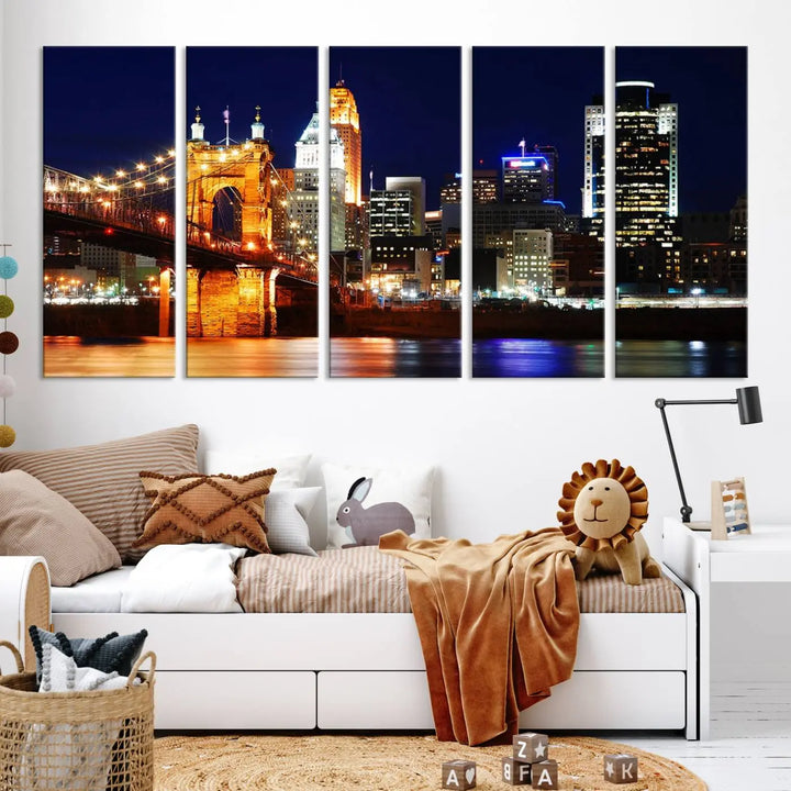 The Cincinnati City Lights Night Skyline Cityscape View Wall Art Canvas Print showcases a stunning night view of a city skyline with an illuminated bridge, making it an ideal museum-quality addition.