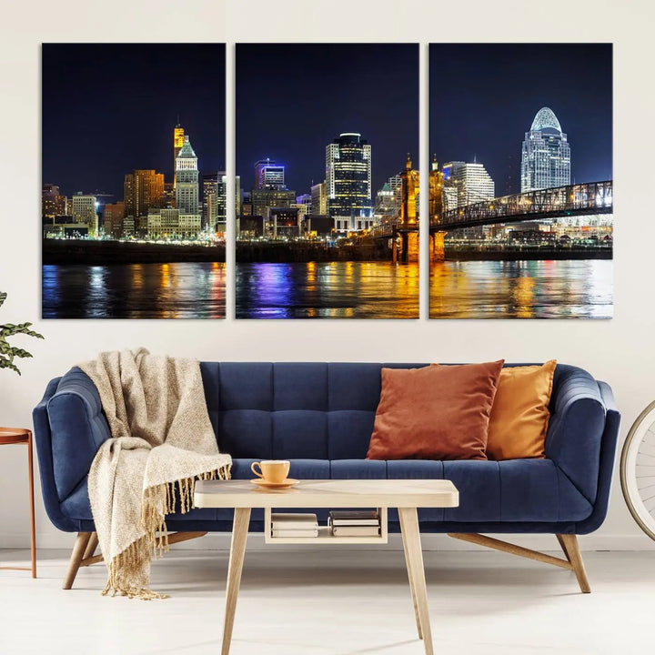 The Cincinnati City Lights Night Skyline Cityscape View Wall Art Canvas Print, crafted on museum-quality canvas with UV-protective coating and ready to hang, adds a touch of sophistication to the wall.