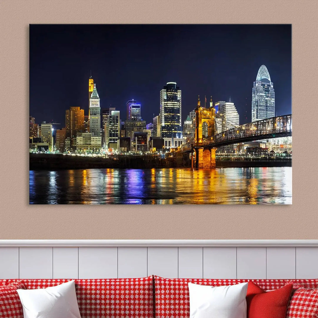 The Cincinnati City Lights Night Skyline Cityscape View Wall Art Canvas Print, crafted on museum-quality canvas with UV-protective coating and ready to hang, adds a touch of sophistication to the wall.