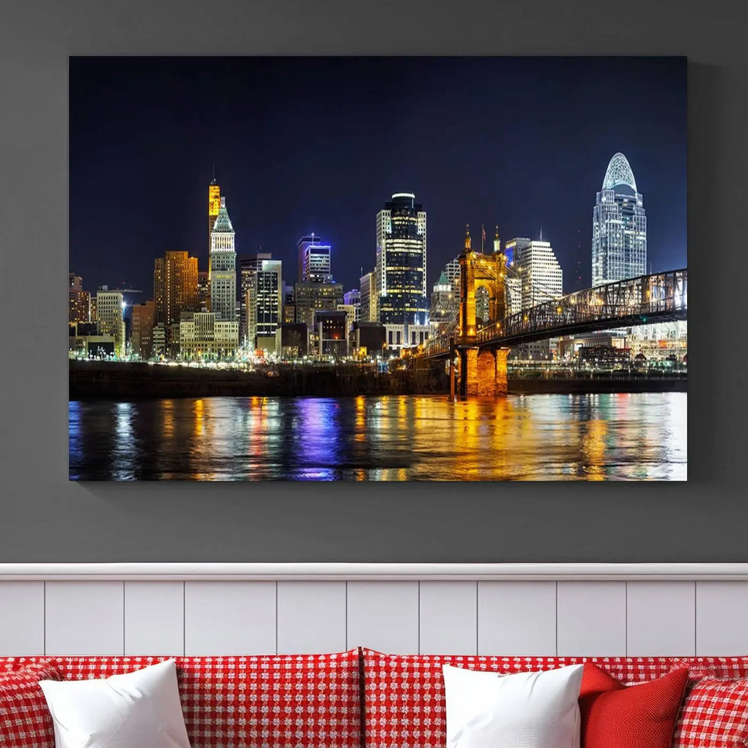 The Cincinnati City Lights Night Skyline Cityscape View Wall Art Canvas Print, crafted on museum-quality canvas with UV-protective coating and ready to hang, adds a touch of sophistication to the wall.