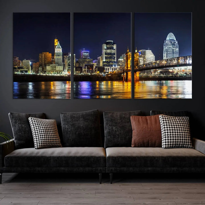 The Cincinnati City Lights Night Skyline Cityscape View Wall Art Canvas Print, crafted on museum-quality canvas with UV-protective coating and ready to hang, adds a touch of sophistication to the wall.