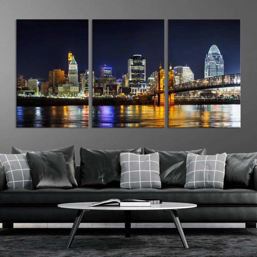 The Cincinnati City Lights Night Skyline Cityscape View Wall Art Canvas Print, crafted on museum-quality canvas with UV-protective coating and ready to hang, adds a touch of sophistication to the wall.