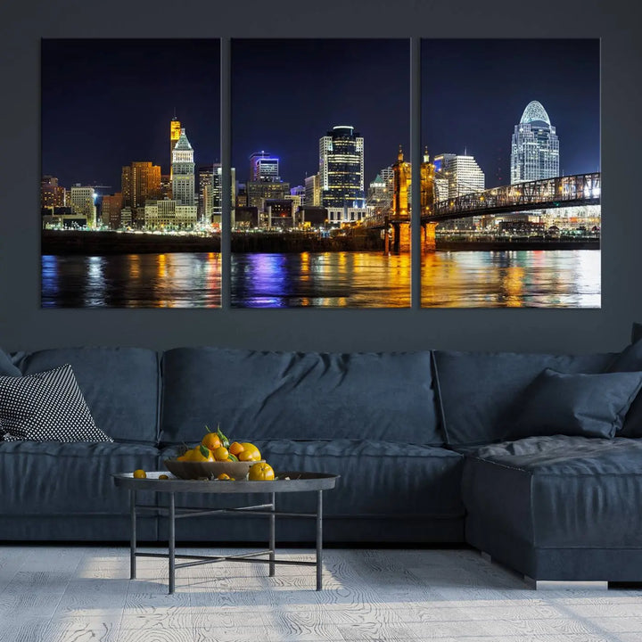 The Cincinnati City Lights Night Skyline Cityscape View Wall Art Canvas Print, crafted on museum-quality canvas with UV-protective coating and ready to hang, adds a touch of sophistication to the wall.