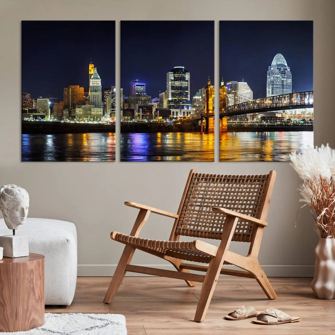 The Cincinnati City Lights Night Skyline Cityscape View Wall Art Canvas Print, crafted on museum-quality canvas with UV-protective coating and ready to hang, adds a touch of sophistication to the wall.