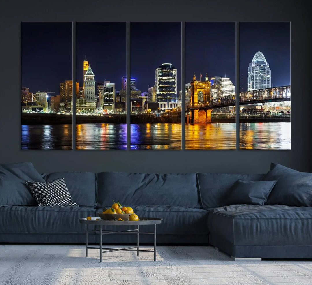 The Cincinnati City Lights Night Skyline Cityscape View Wall Art Canvas Print, crafted on museum-quality canvas with UV-protective coating and ready to hang, adds a touch of sophistication to the wall.