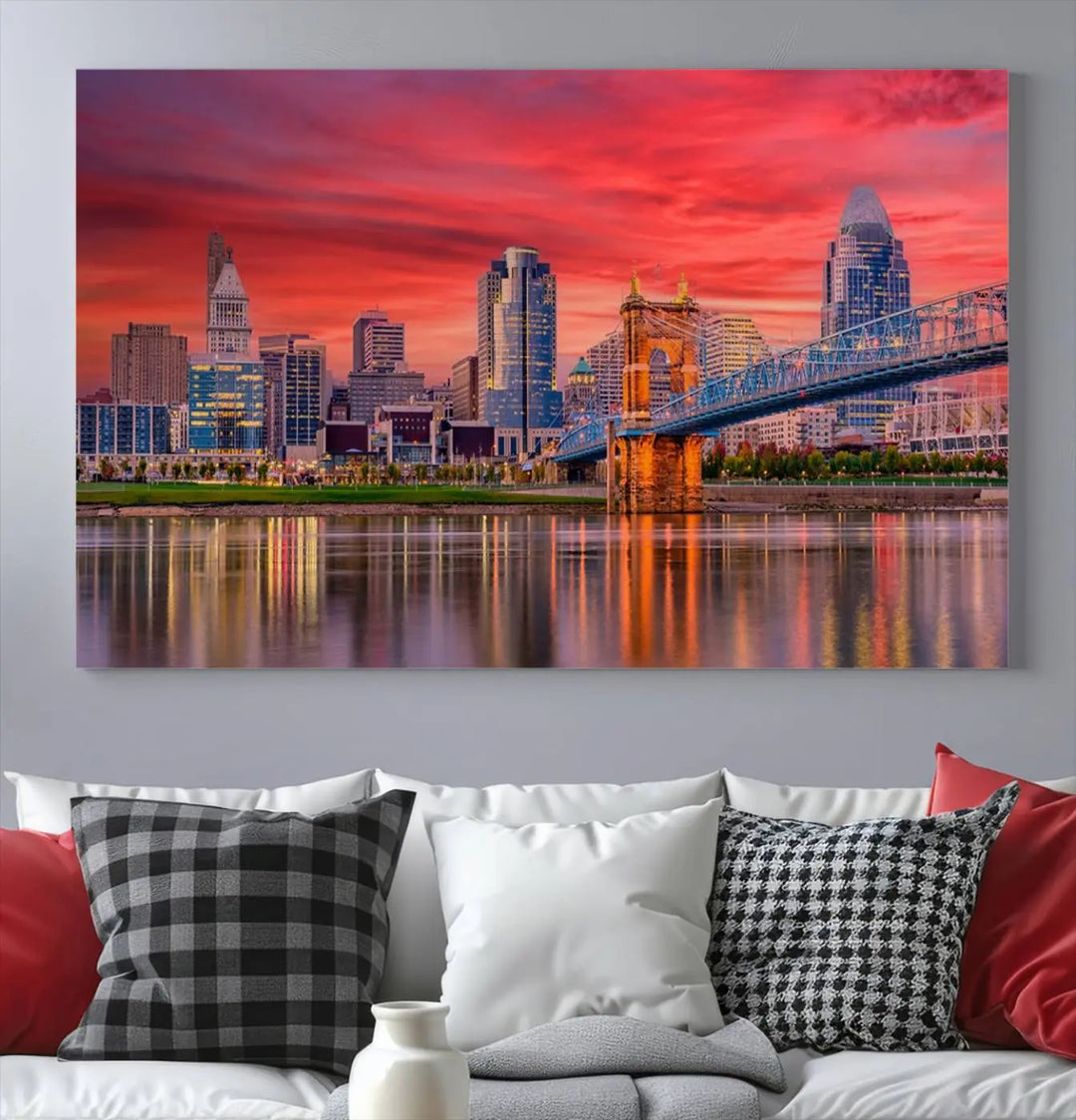 The Cincinnati City Lights Red Sunset Skyline Cityscape View Wall Art Canvas Print is beautifully crafted on museum-quality polycotton canvas with a UV-protective coating, ensuring the artwork is vibrant and ready to hang.