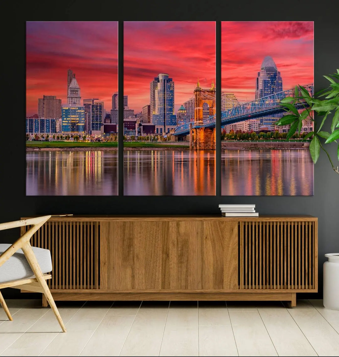 The Cincinnati City Lights Red Sunset Skyline Cityscape View Wall Art Canvas Print is beautifully crafted on museum-quality polycotton canvas with a UV-protective coating, ensuring the artwork is vibrant and ready to hang.