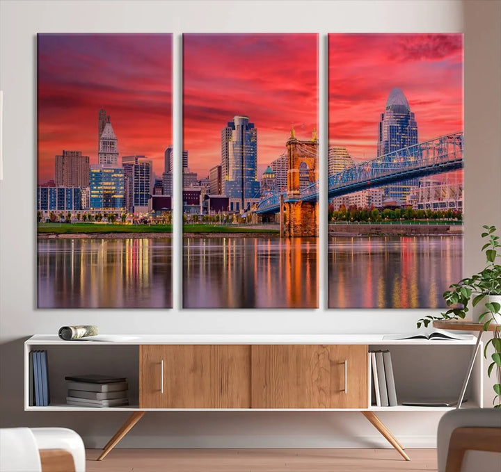 The Cincinnati City Lights Red Sunset Skyline Cityscape View Wall Art Canvas Print is beautifully crafted on museum-quality polycotton canvas with a UV-protective coating, ensuring the artwork is vibrant and ready to hang.