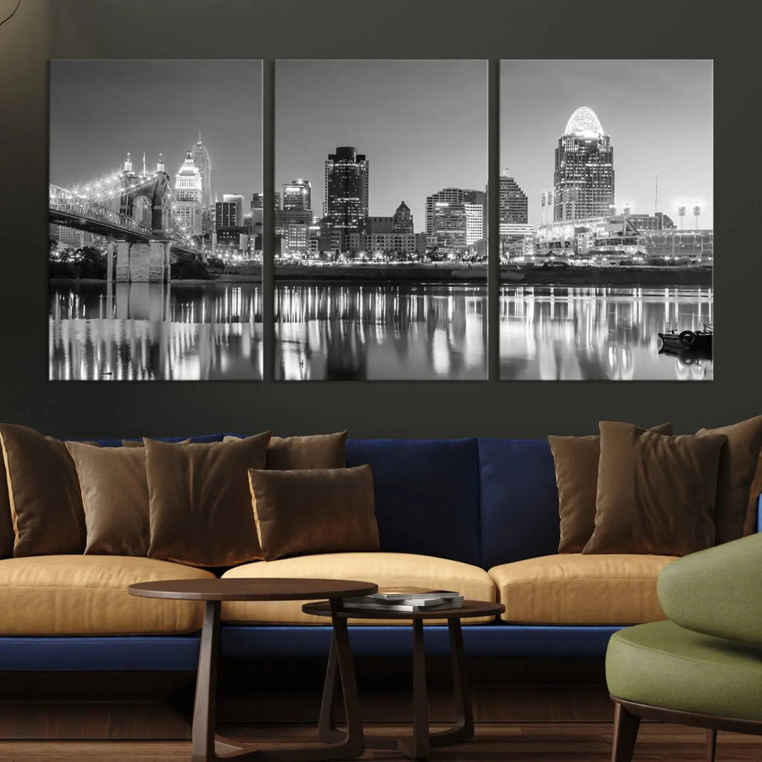 The "Cincinnati City Lights Skyline Black and White Wall Art Cityscape Canvas Print" is elegantly displayed in a stylish living room.