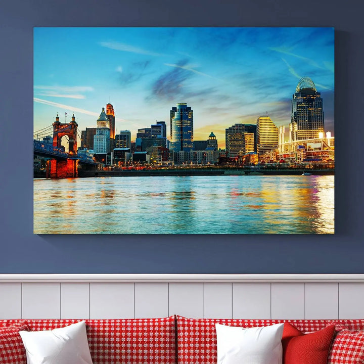 A triptych titled "Cincinnati City Lights Sunset Bright Blue Skyline Cityscape View Wall Art Canvas Print" is showcased, each canvas expertly crafted with museum-quality precision on a stretched wood frame.